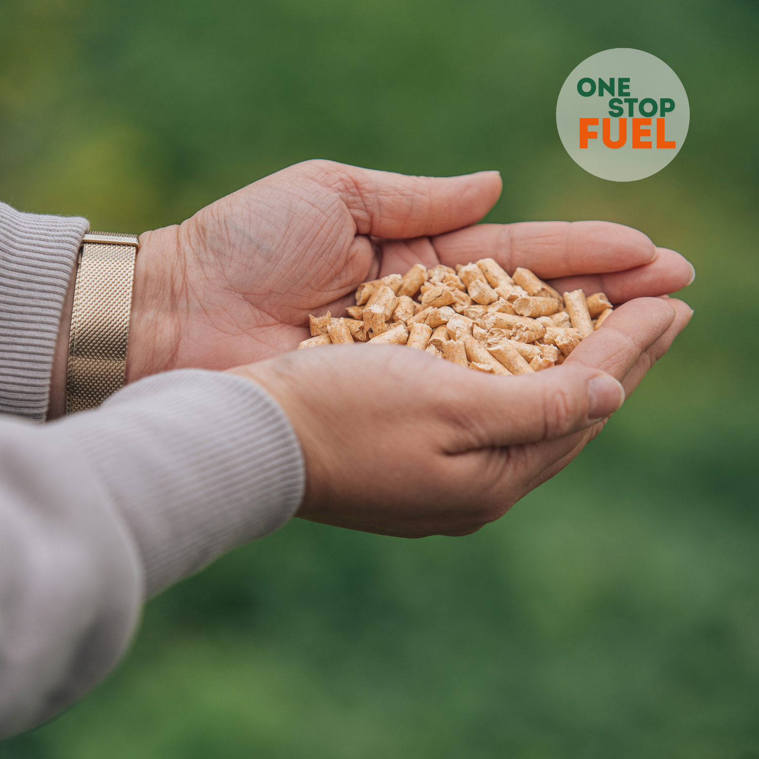 Hands holding ENplus A1 certified wood pellets showing clean and efficient heating fuel quality – The OneStopFuel Ireland