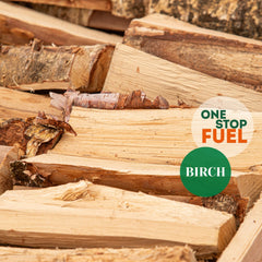 Close-up of kiln-dried birch logs showing natural texture and perfect-sized firewood pieces - The OneStopFuel Ireland