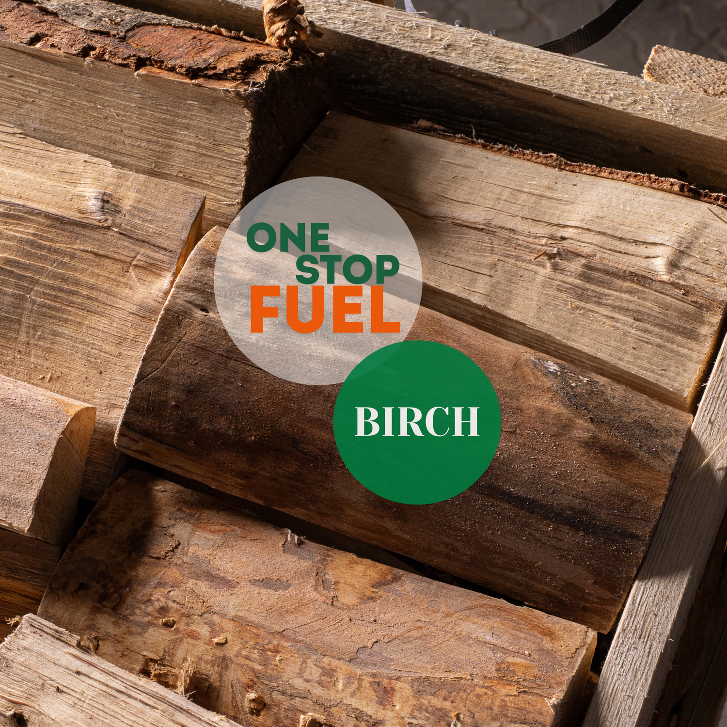 Stack of birch logs with The OneStopFuel branding on a wooden background