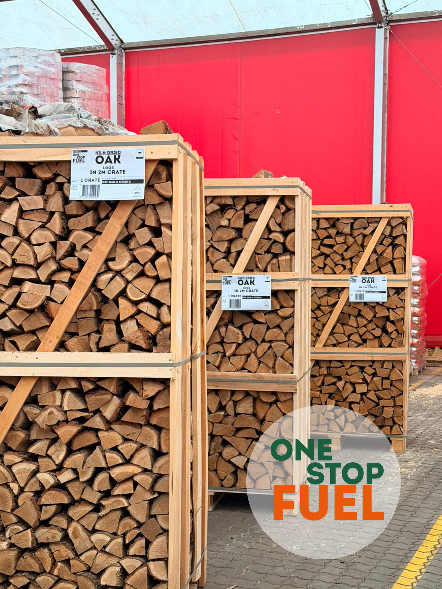 Close-up of kiln-dried oak logs in wooden crates in warehouse ready for delivery - The OneStopFuel Ireland